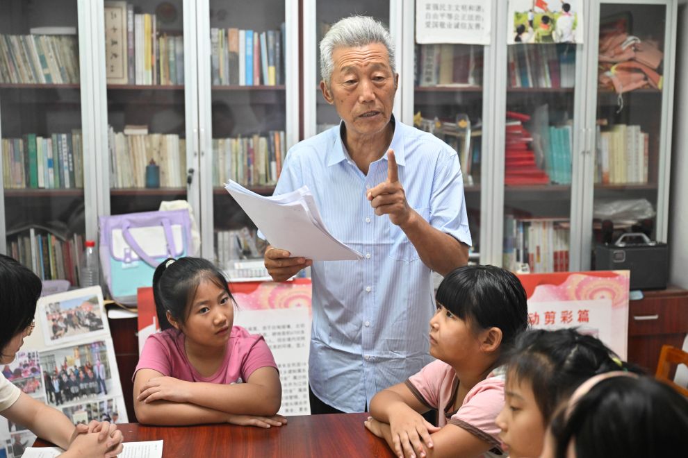 图片故事|21年坚imToken官网下载守,只为村里孩子们