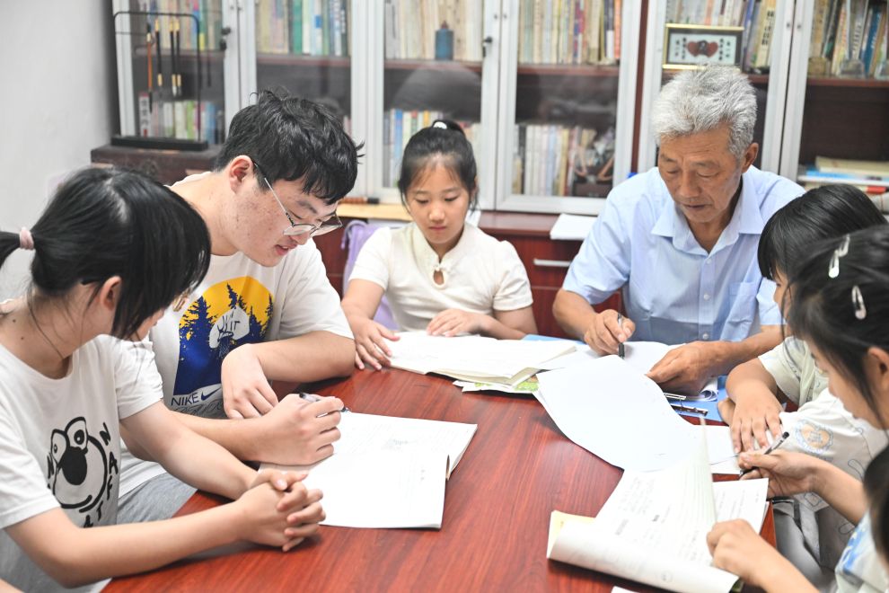 图片故事|21年坚imToken官网下载守,只为村里孩子们