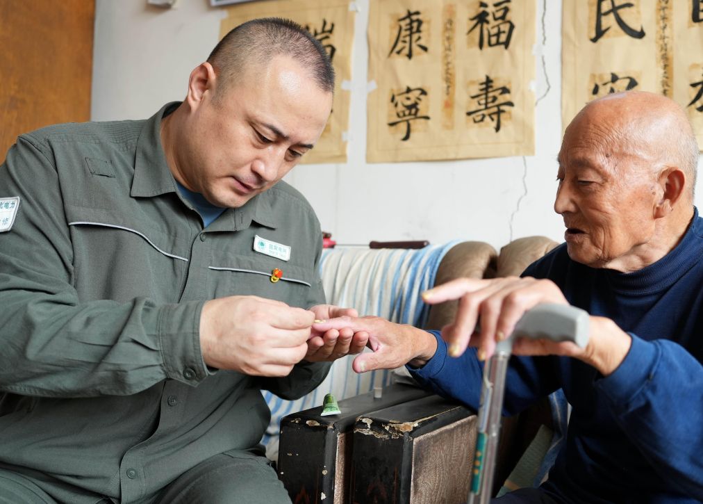 图片故事|一句“我im钱包官网来管你们”让他守了21年